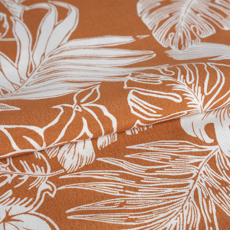 Bohato tkaná krepová tkanina s potlačou